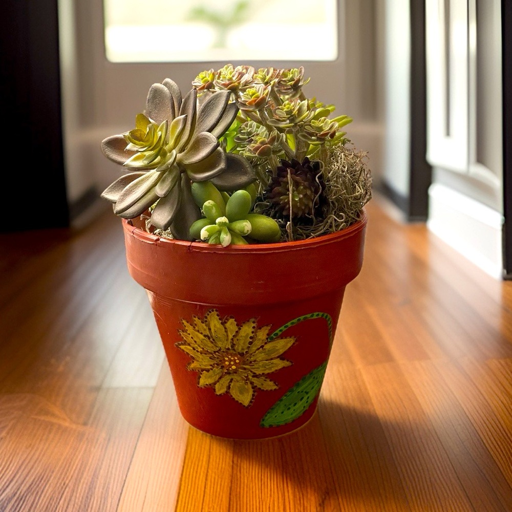 Hand crafted upcycled Terra cotta pot painted rust with yellow green sunflowers